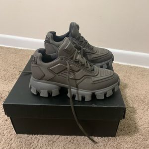 Gently worn, fabric upper has been treated to be water resistant not waterproof